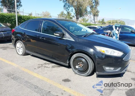2017 Ford Focus Titanium from USA, damaged, VIN 1FADP3J2XHL292836